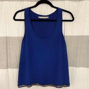 Paper Crane women’s sleeveless blouse w/ sequin waist. Royal blue color, size M